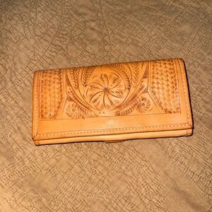 Elegant Tan Leather Wallet with Intricate Design